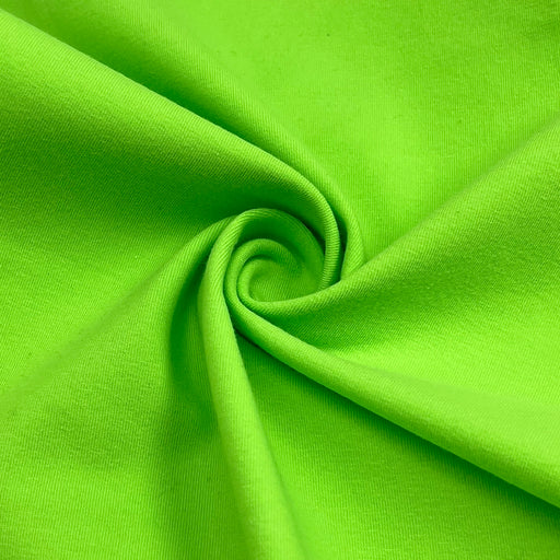 Close-up of green fabric with a swirl pattern