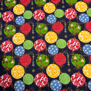 Colorful pattern of round ornaments on a dark blue background