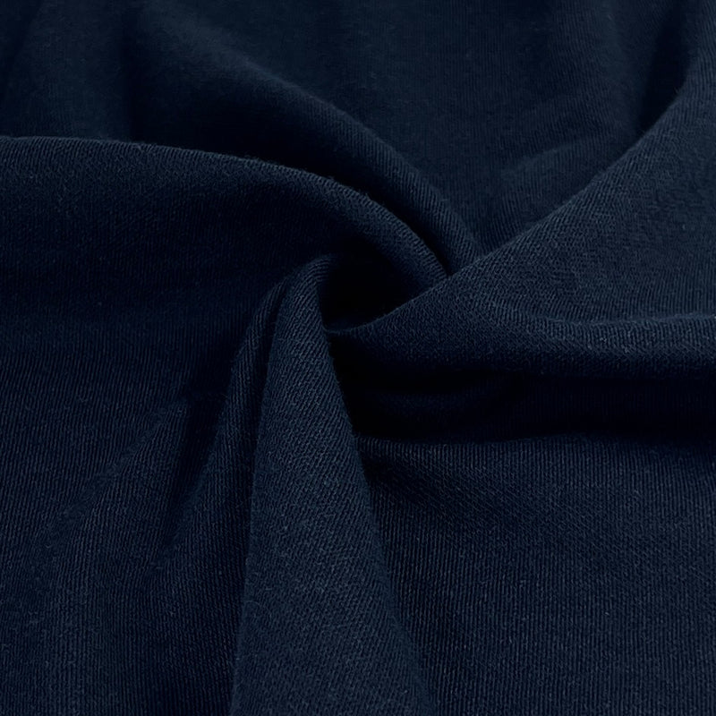 Deep, rich navy colored polyester/acrylic/cotton jersey knit ideal for long sleeves and lightweight sweaters. 