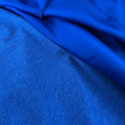 Close-up of blue fabric with a textured pattern