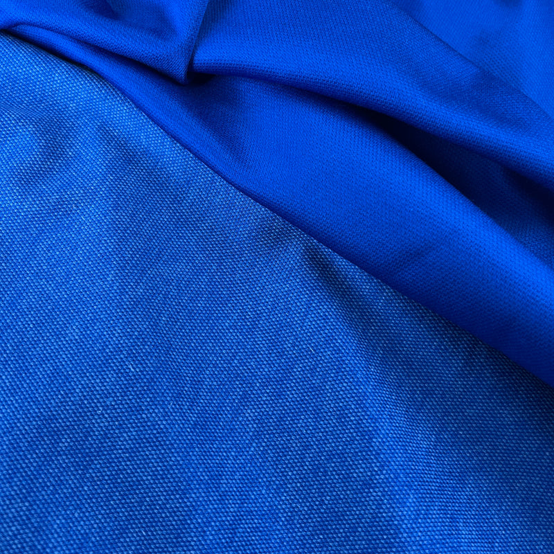 Close-up of blue fabric with a textured pattern