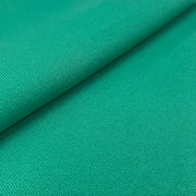 Close-up of green fabric with a slight texture
