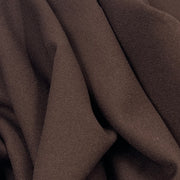 Close-up of brown fabric with folds