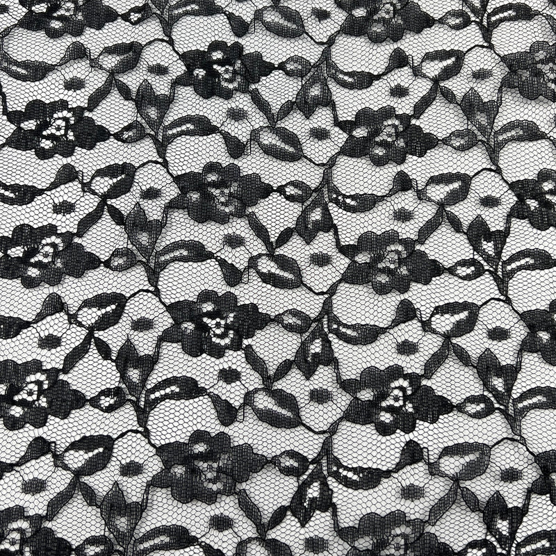 Black floral lace pattern on a white background