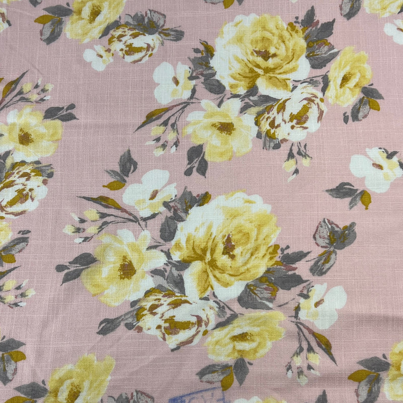 Floral pattern with yellow and white flowers on a pink background