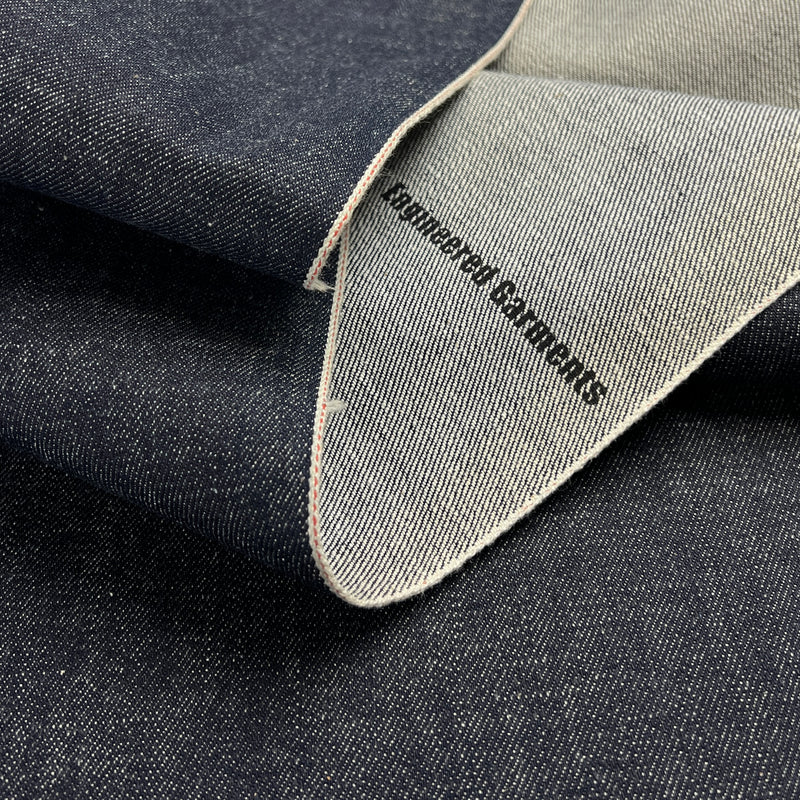 Close-up of denim fabric with 'Engineered Garments' label