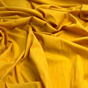 Close-up of yellow fabric with folds
