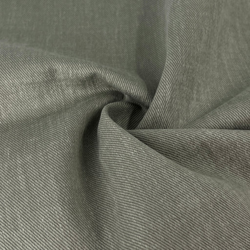 Close-up of gray fabric with a subtle pattern