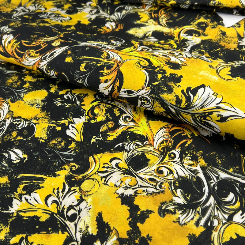 Decorative fabric with yellow and black baroque pattern