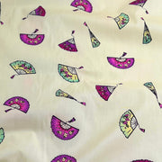 Pattern of colorful fans on a beige background