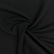 Close-up of black fabric with a subtle texture