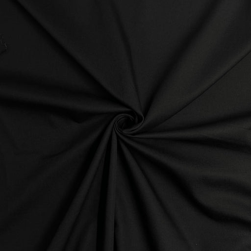 Black polyester and cotton based twill fabric with a 2x1 weave, crisp texture and versatile application