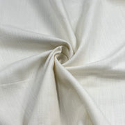 A close-up of off-white woven fabric with a soft, textured surface, arranged in a spiral drape to show its texture and drape.