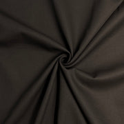 Close-up of dark brown fabric with a visible crease