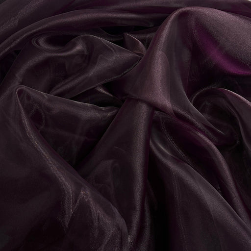 Dark plum purple sheer organza fabric with a glossy, lustrous sheen, draped in soft folds.