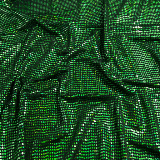 Green sequined fabric with a shimmering, metallic finish, draped in soft folds to show its texture and reflective properties.