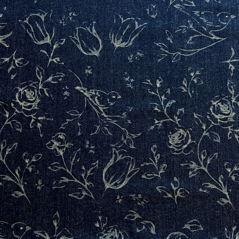 Dark navy blue fabric with a light beige floral and bird pattern, featuring roses, tulips, and small birds.