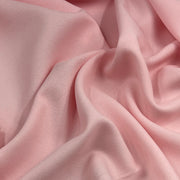 Pink textured polyester crepe fabric for suits