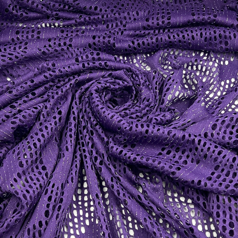 Purple open-knit fabric with a textured, sheer mesh pattern, arranged in a spiral drape to show its texture and color.