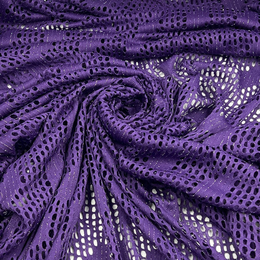 Purple open-knit fabric with a textured, sheer mesh pattern, arranged in a spiral drape to show its texture and color.