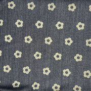 Custom laser printed fabric featuring a retro floral design on a 30" wide indigo denim fabric