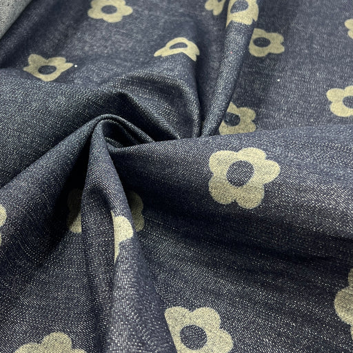 Custom laser printed fabric featuring a retro floral design on a 30" wide indigo denim fabric