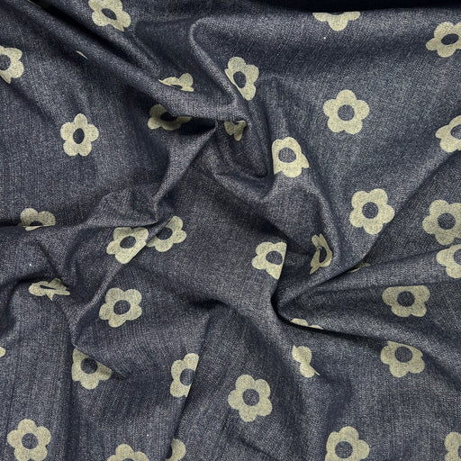 Custom laser printed fabric featuring a retro floral design on a 30" wide indigo denim fabric