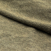 A close-up of a textured knit fabric in a muted olive-brown color, showing the detailed ribbed weave and soft fold.