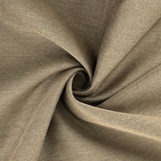 Closeup of khaki and black broken twill zig-zag suiting folded into a swirl. 